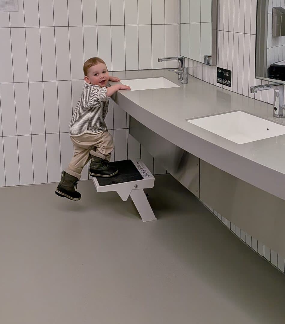 Retractable step in use