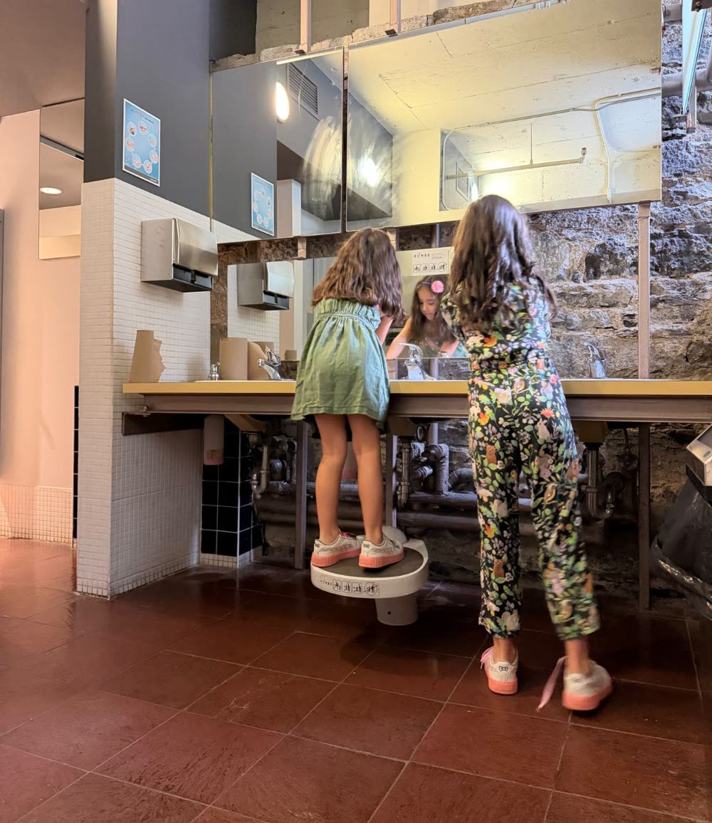 Two kids, two sinks